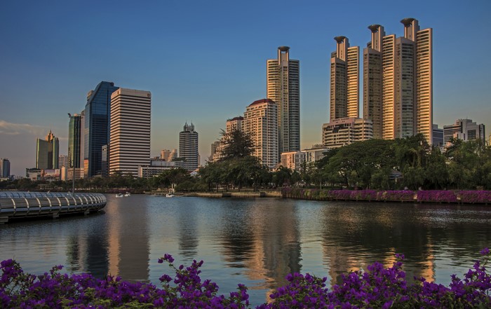 Bangkok skyscrapers by the river at dusk