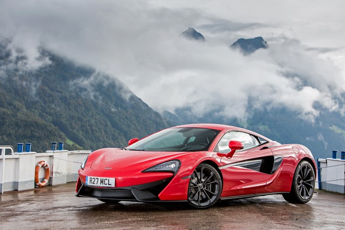 Red McLaren 540C Coupe on a Pier