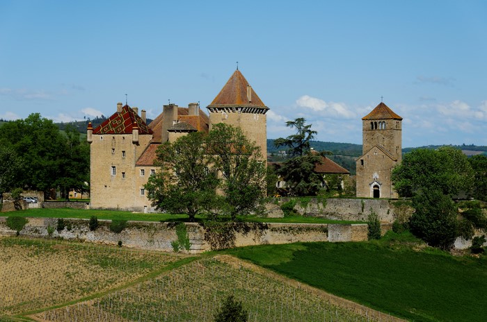 Chateau de Pierreclos and church in France