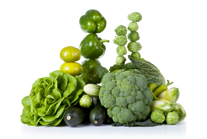 Assortment of Green Vegetables on White Background