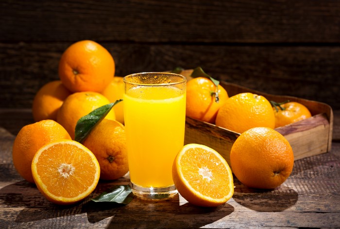 Oranges and orange juice in a glass