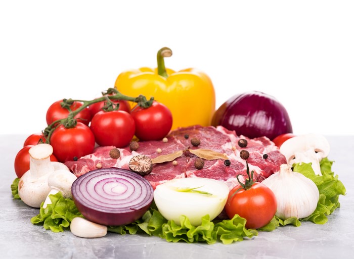 Meat and vegetables with tomatoes, onion, bell pepper