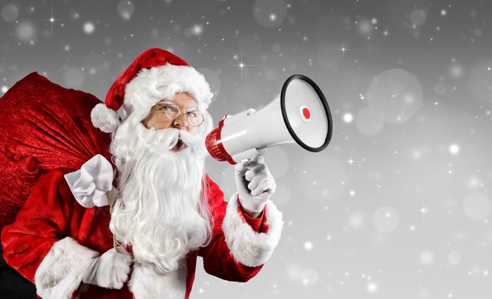 Santa Claus with a Megaphone and Gift Bag