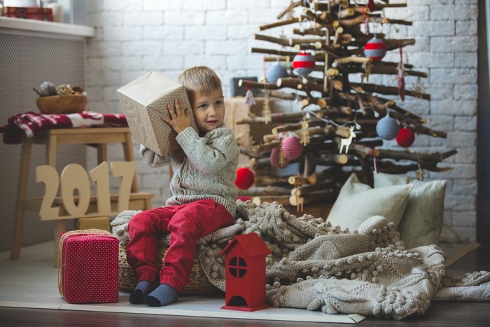 Boy with Christmas Gifts and 2017 Decorations