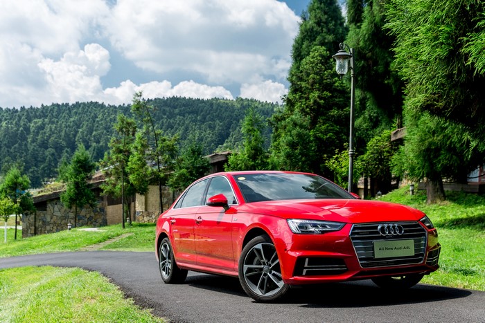 Red Audi A4 L 45 TFSI quattro line sedan
