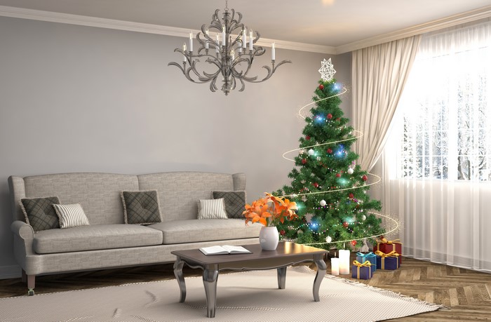 Living room with Christmas tree and sofa
