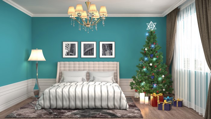 Bedroom with Christmas Tree and Gifts