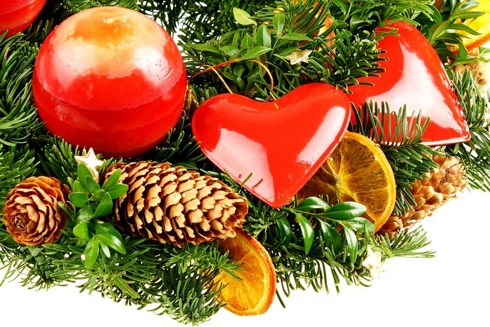 Christmas decoration with pine cones and red hearts