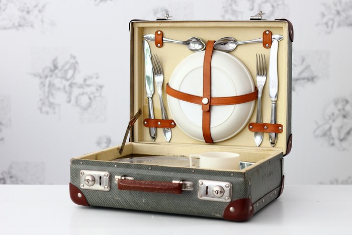 Picnic suitcase with cutlery and plate