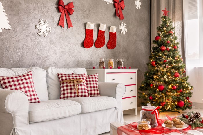 Christmas Living Room with Tree, Sofa, and Decorations