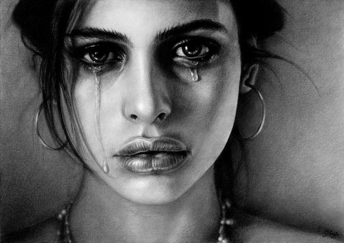 Black and white portrait of a crying woman
