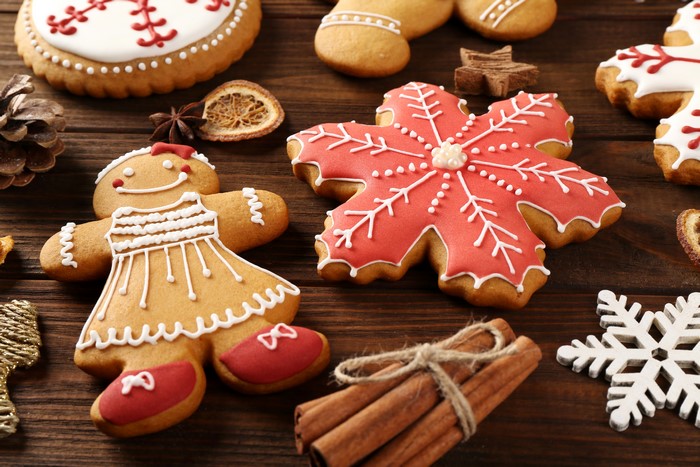 Christmas cookies with cinnamon sticks and snowflakes