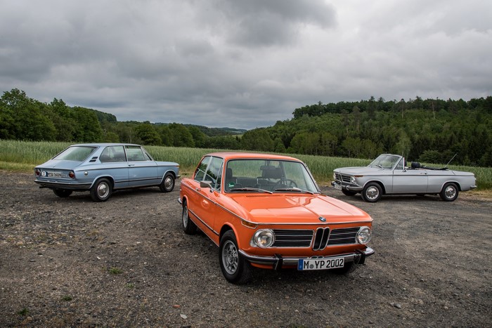 Three BMW 02 Series cars