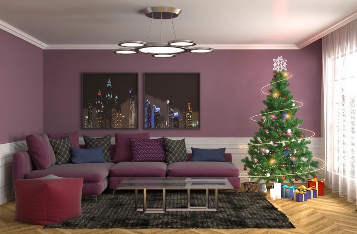 Living room with Christmas tree and sofa
