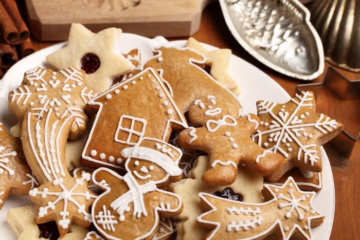 Christmas cookies with gingerbread house and snowflakes
