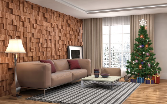Living room with Christmas tree and sofa