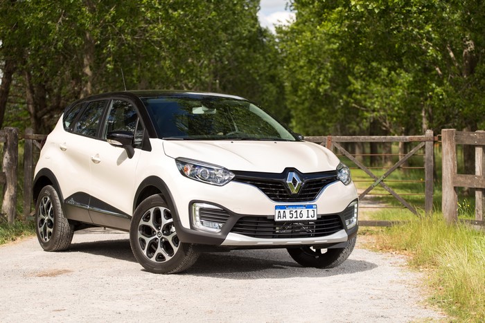 White Renault Captur parked on a dirt road