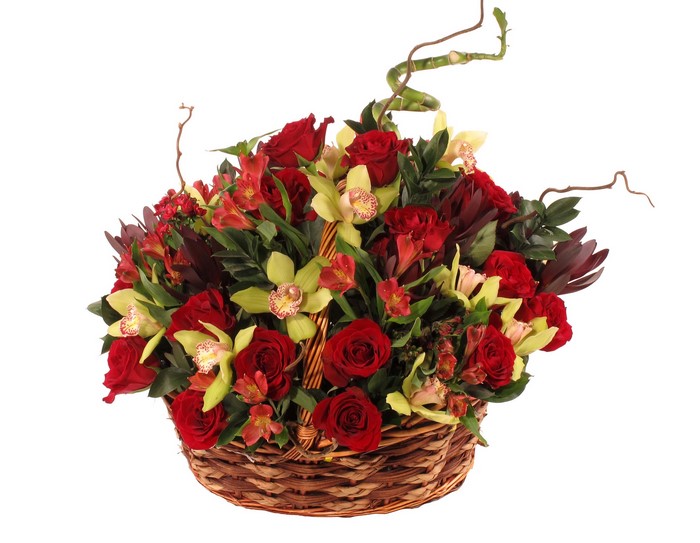 Red roses and orchids in a wicker basket