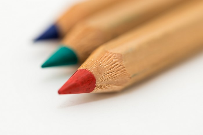 Close-up of three colored pencils