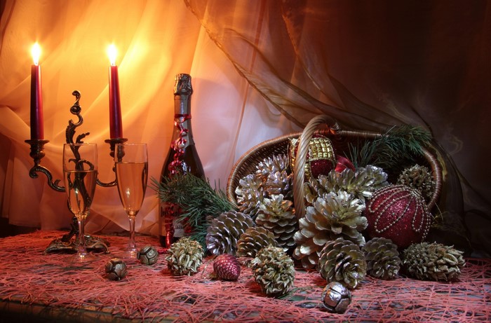 Christmas still life with champagne and candles