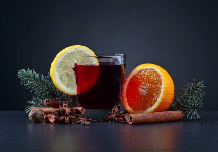 Mulled wine with orange, lemon, and spices