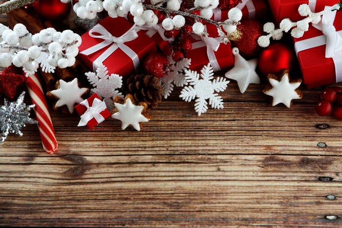 Christmas Decorations with Gifts and Cookies on Wood