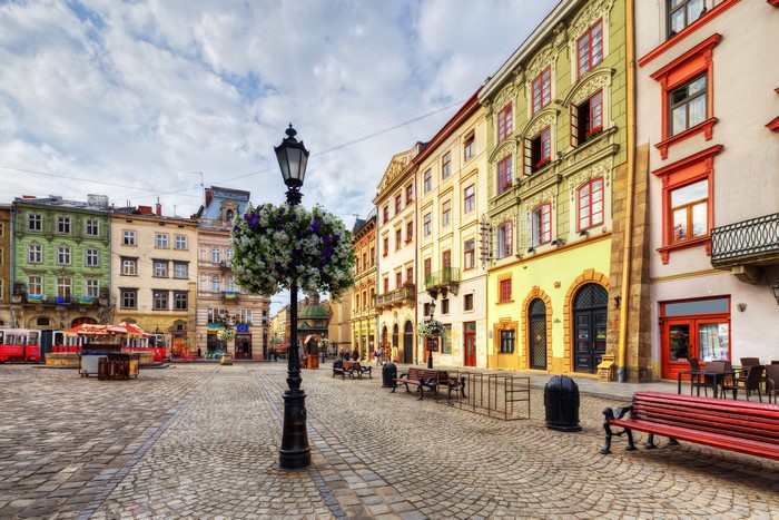 Lviv street with colorful buildings and cobblestone square