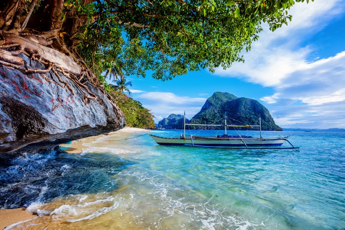 Boat on a tropical beach in the Philippines