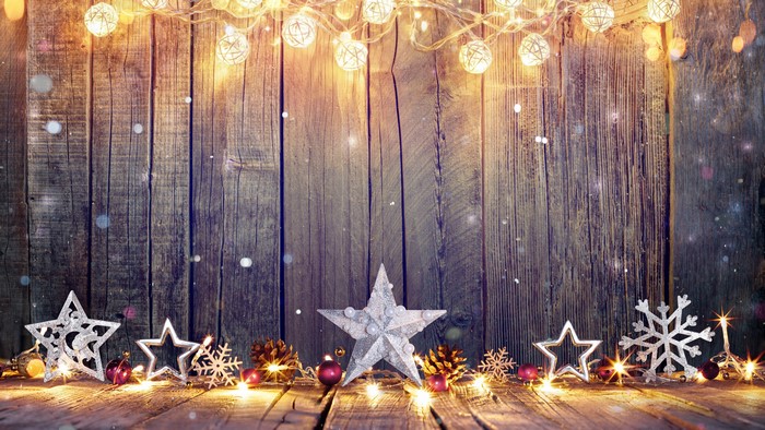 Christmas Decorations on Wood Planks with Fairy Lights