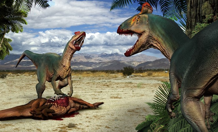 Cryolophosaurus dinosaurs feeding on a carcass