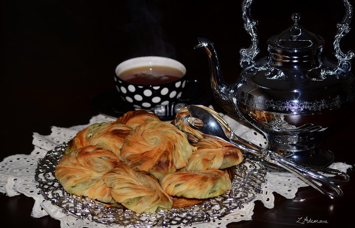 Pastries with tea and kettle