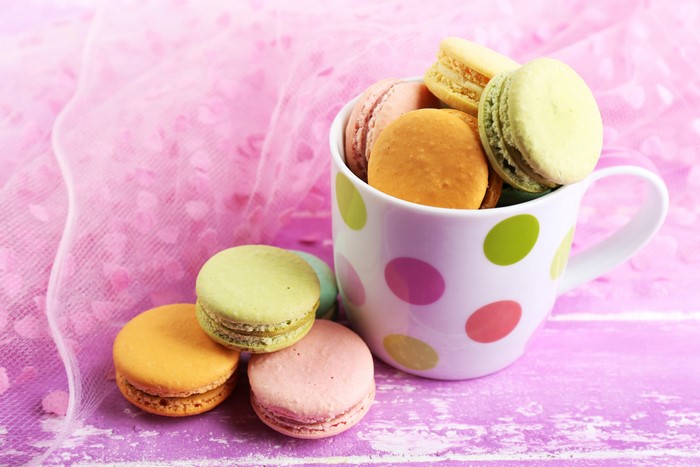 Macarons in a polka dot cup