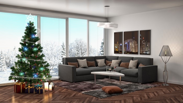 Christmas interior with tree, sofa, and gifts