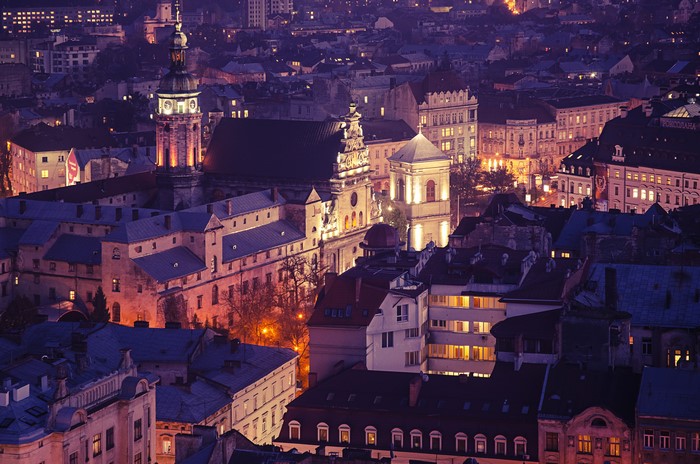 Lviv, Ukraine at Night with Towers and Houses