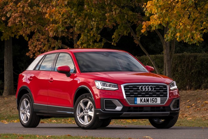 Red Audi Q2 TFSI Sport parked outdoors