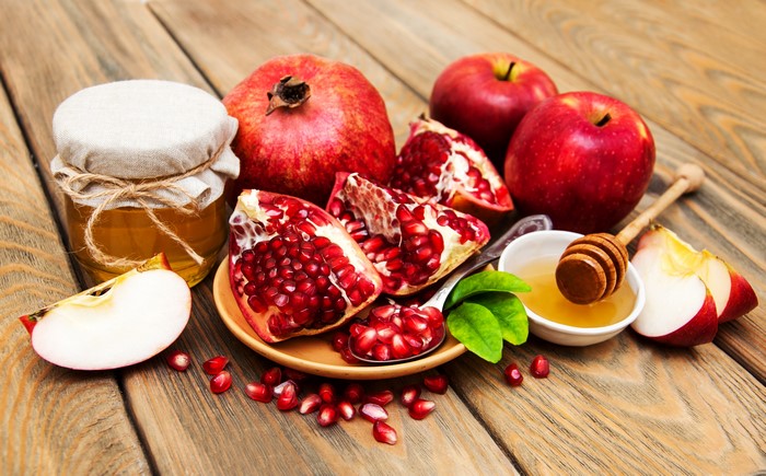 Pomegranates, Apples, and Honey on Wood
