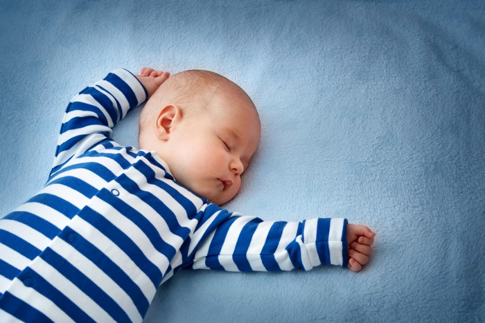 Baby Sleeping on Blue Blanket