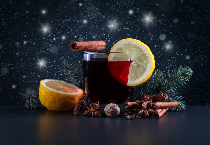 Mulled wine with lemon, cinnamon, and star anise