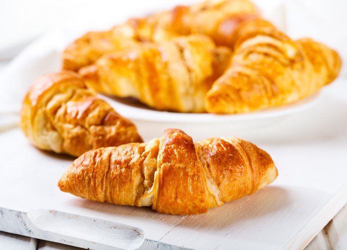Croissants on a white board