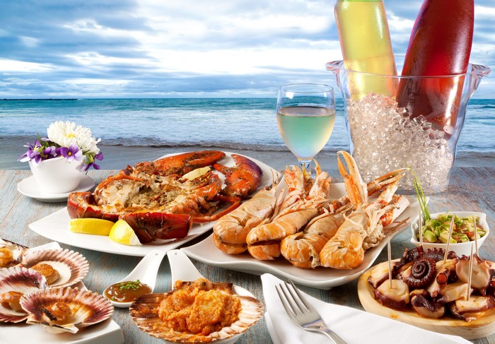 Seafood platter with lobster and shrimp by the ocean