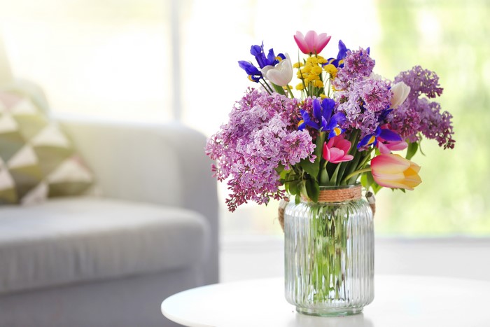 Bouquet of Lilac, Tulips, and Irises in a Glass Jar