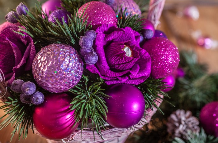 Christmas bouquet with purple ornaments and pine branches