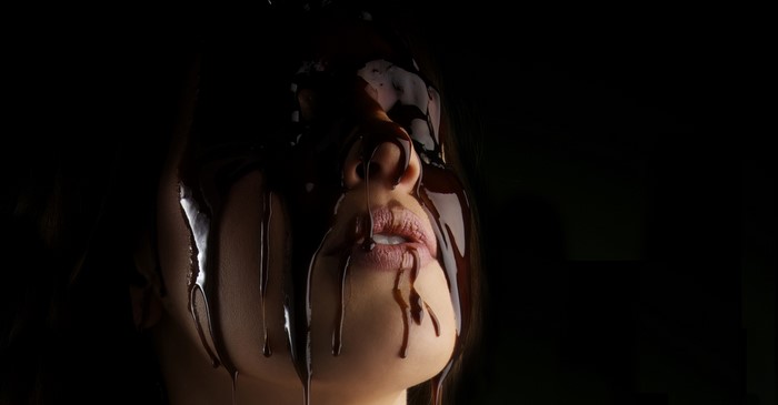 Chocolate poured over Jordan Carver's face