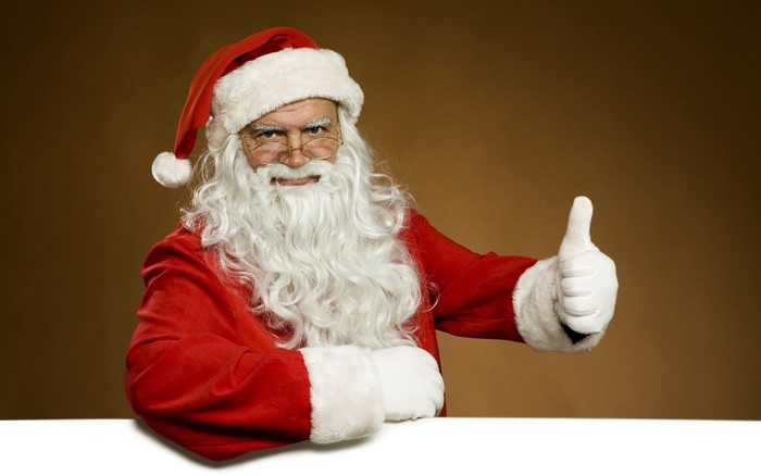 Santa Claus giving a thumbs up
