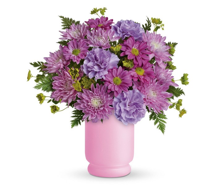 Pink and purple flower bouquet in a pink vase