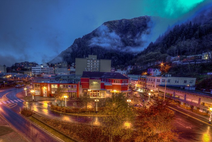 Juneau, Alaska at night with mountains and street lights