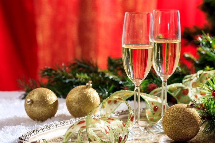 Champagne glasses with Christmas decorations