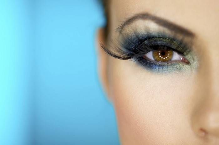 Close-up of a woman's eye with dramatic makeup