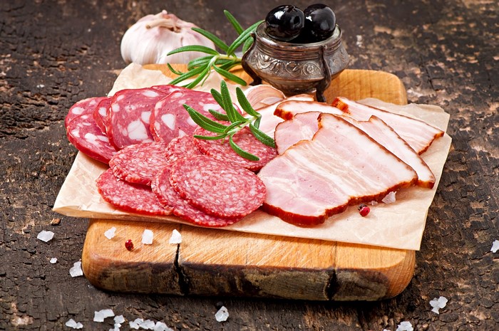 Meat products: ham, sausage, olives, garlic, rosemary