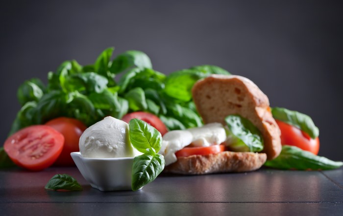 Caprese salad ingredients with bread